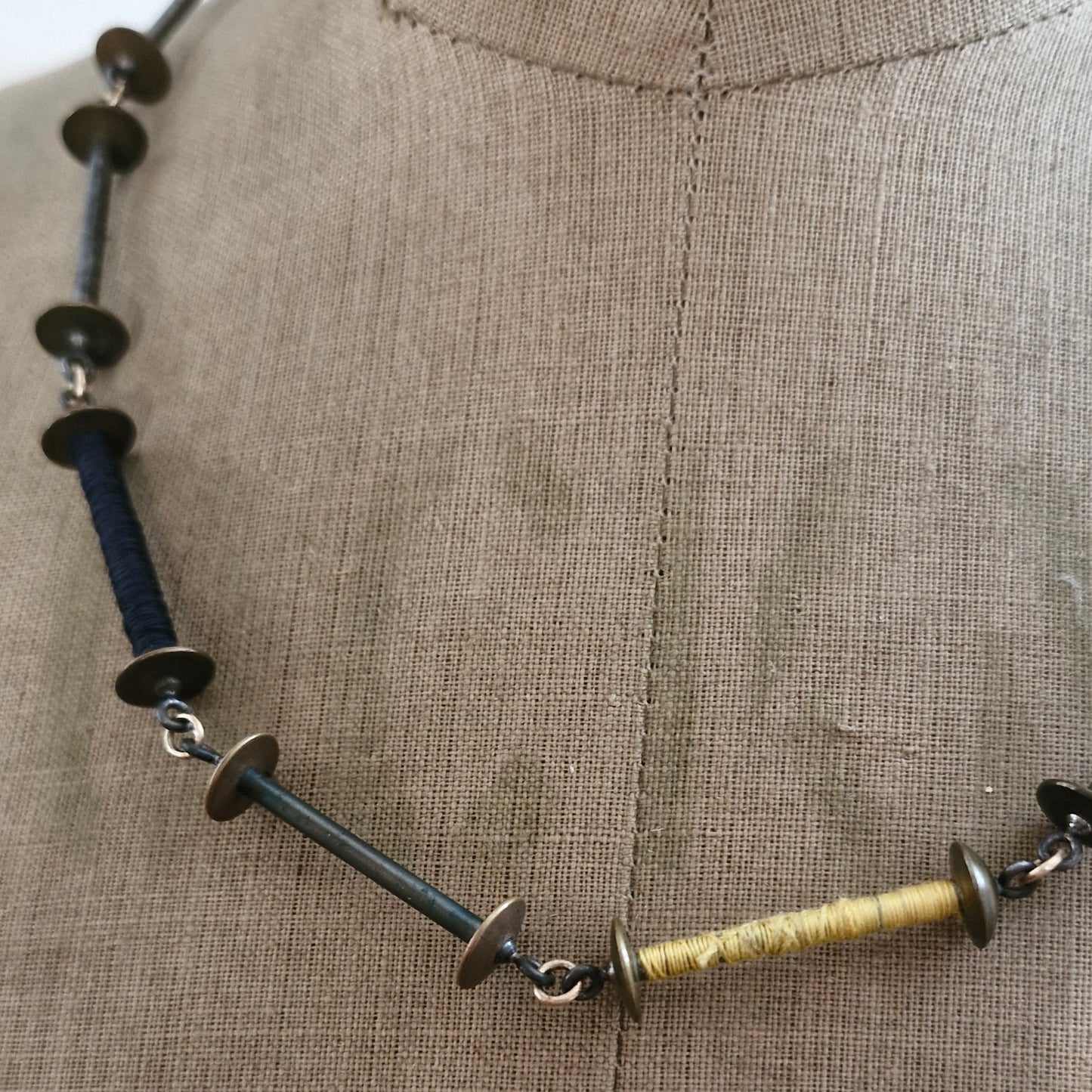 Bobbin neckpiece