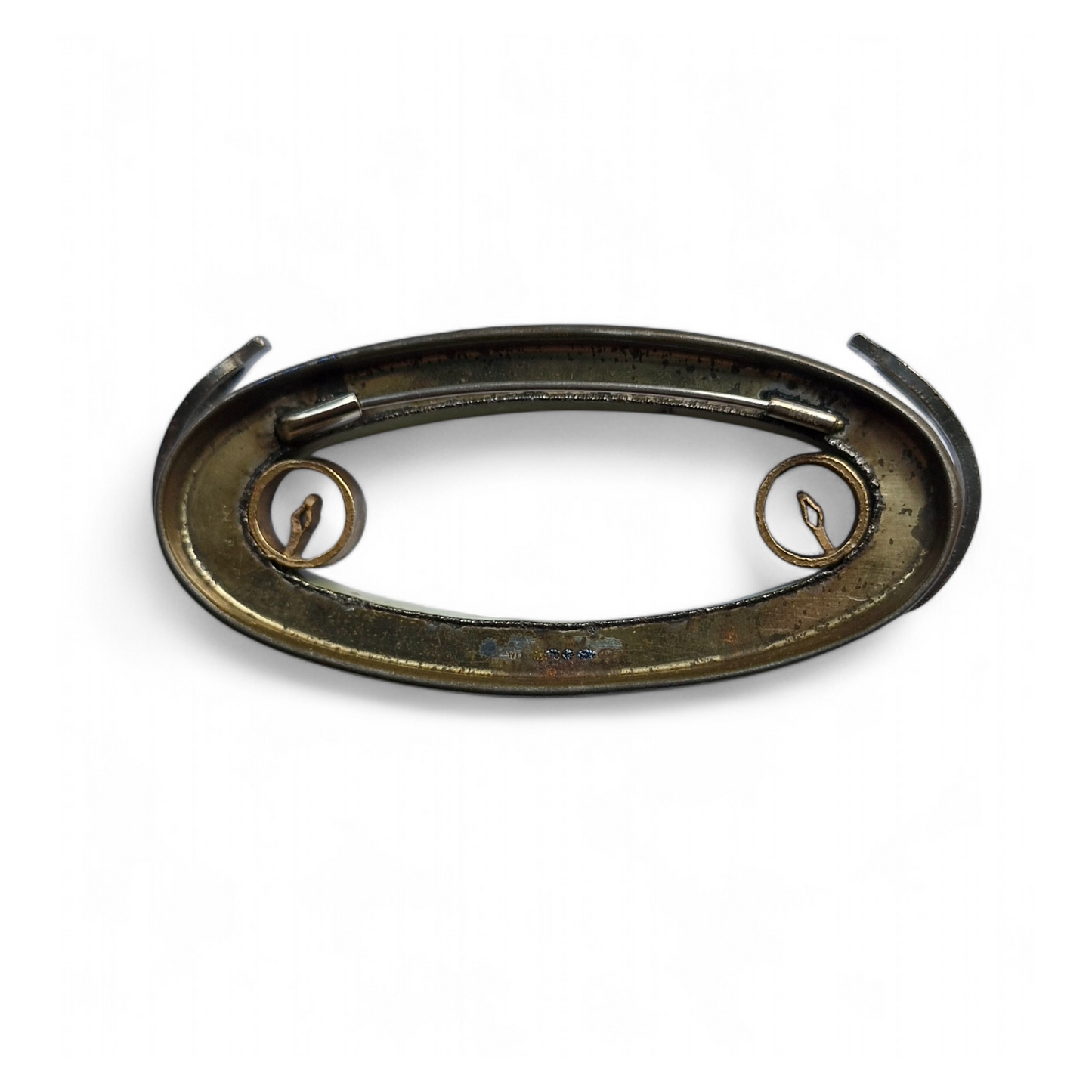 Natural balance brooch