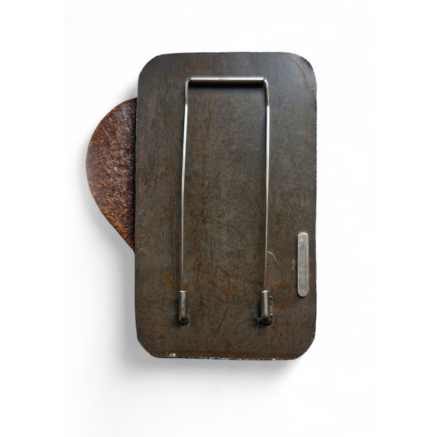 Old money brooch